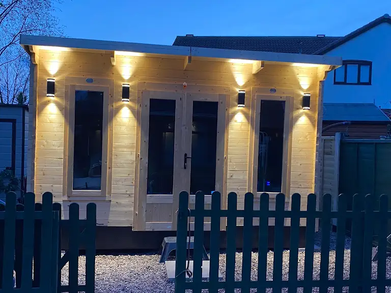 Electrically fitted garden room or garage building