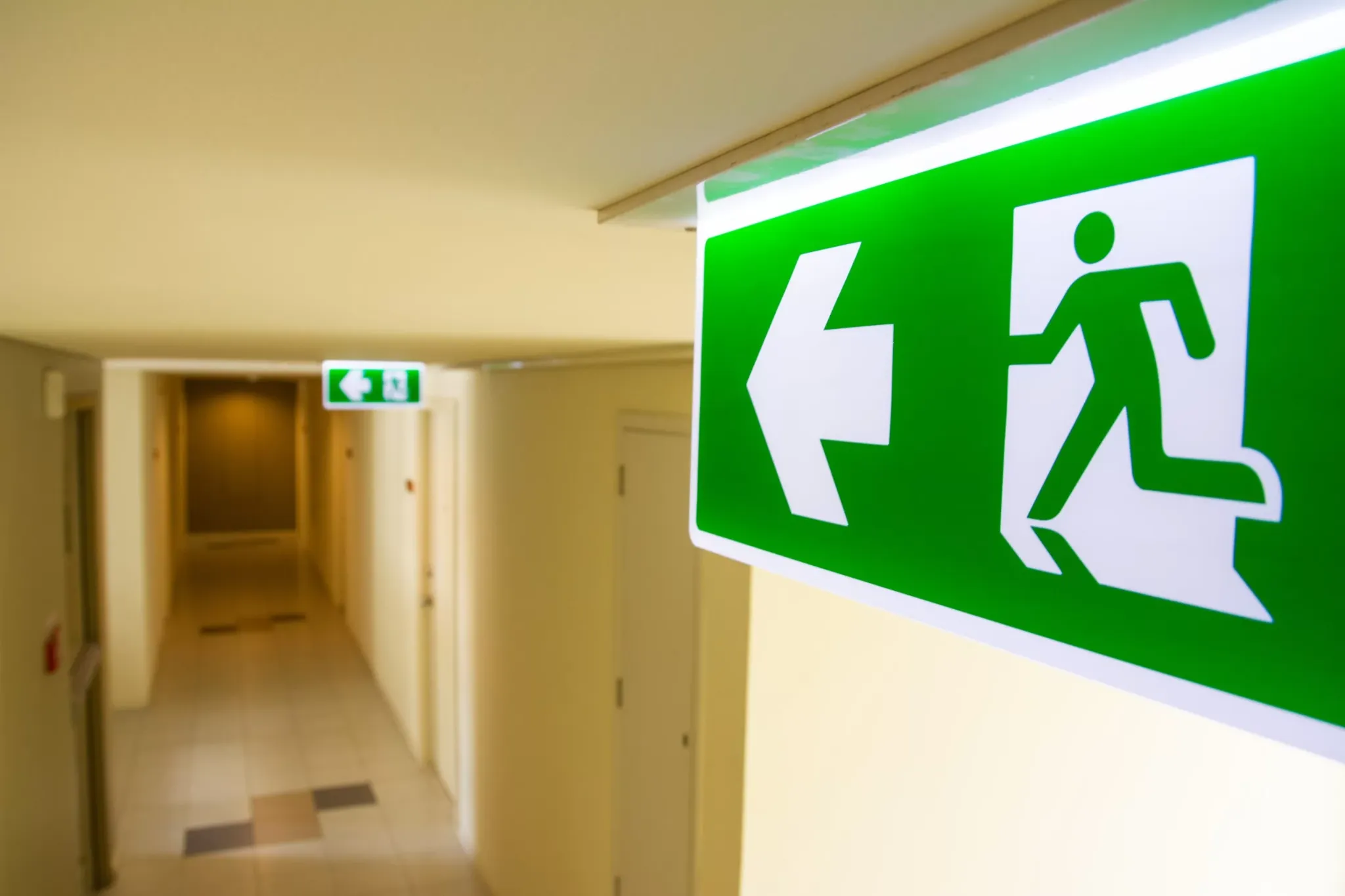 Emergency exit lighting in a corridor