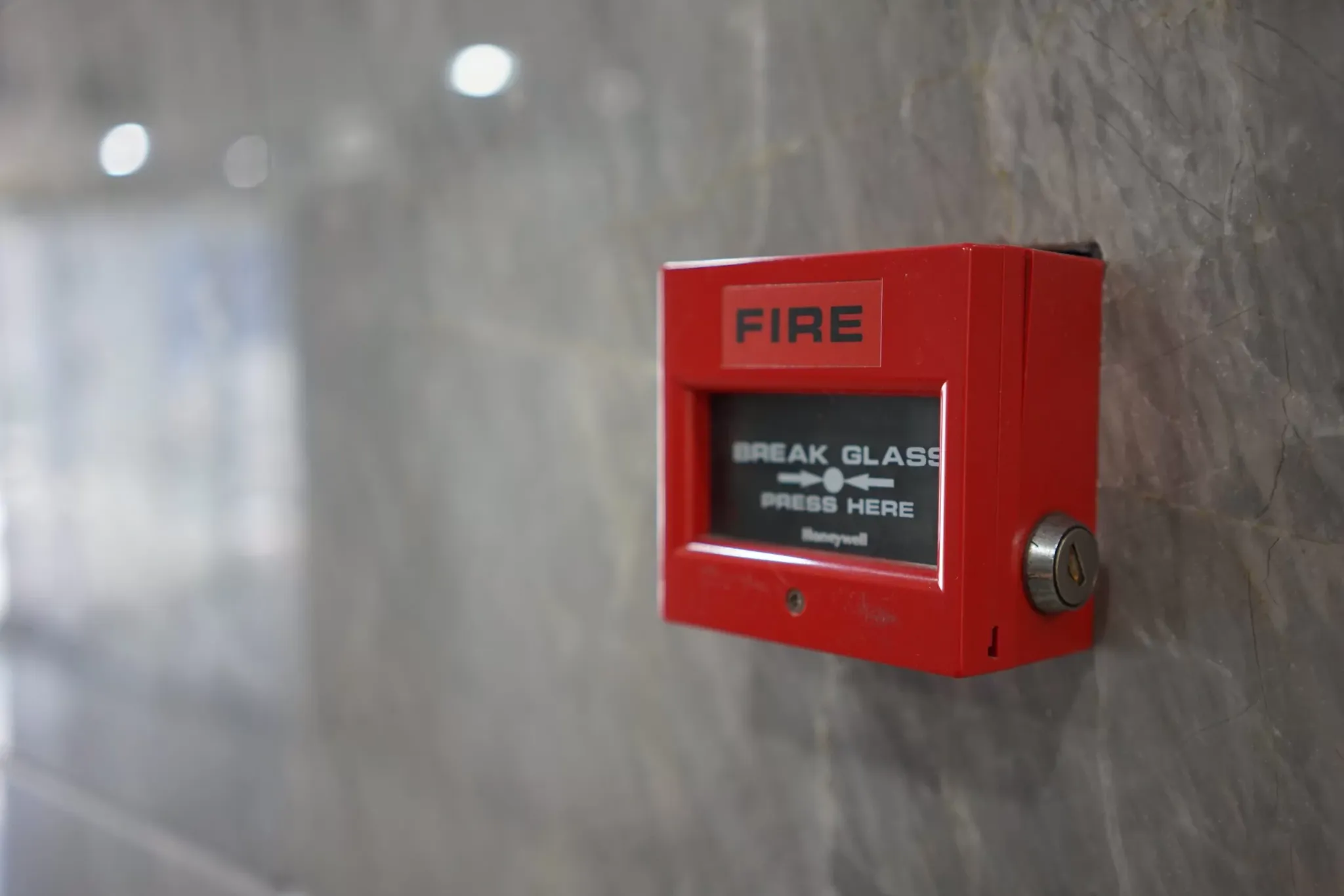 Wall-mounted fire alarm call point